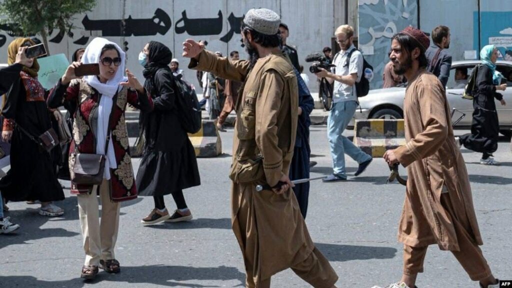 UNAMA: Arrest of Women over Taliban’s Mandatory Dress Code Reflects Alarming Trend of Fear, Repression, and Systematic Exclusion of Afghan Women The United Nations Assistance Mission in Afghanistan (UNAMA) has expressed grave concern over the recent arrest of dozens of women and girls in Kabul by the Taliban’s morality police for allegedly violating the group’s strict dress code. UNAMA warned that such actions contribute to the growing isolation of women and girls, erode public trust, and intensify a climate of fear across the country. In a statement posted on the social platform X (formerly Twitter) on Sunday, July 21 (31 Saratan), UNAMA called on the Taliban to immediately repeal policies that restrict the fundamental rights and freedoms of Afghan women and girls. The organization emphasized that coercive enforcement of dress codes violates basic human rights and undermines social cohesion and women’s participation in public life. This response comes after local reports from the Dasht-e-Barchi area of Kabul—a predominantly Shia community—confirmed that Taliban morality enforcers arrested dozens of young women on Friday and Saturday (27–28 Saratan) for not adhering to the group’s interpretation of “proper Islamic hijab.” According to sources, Taliban forces used physical violence during the arrests, and no female officers were present throughout the operations—clear violations of international standards for the treatment of female detainees. UNAMA stated it is in contact with Taliban officials to obtain further details about the incidents. The agency stressed that such practices only deepen mistrust and fear, obstruct social reintegration, and diminish any remaining hope among women for a more inclusive and secure future in Afghanistan. In its concluding remarks, UNAMA reiterated: “We once again call on Taliban authorities to rescind policies and practices that limit the human rights and fundamental freedoms of women and girls. Women must be able to participate in the social, economic, and cultural life of the country without fear of repression or violence.”